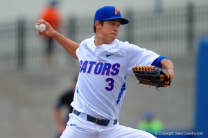 "Florida Gators pitcher Dane Dunning throwing from the mound during the first inning. Florida Gators vs Miami Hurricanes. February 22nd, 2015. Gator Country photo by David Bowie. "