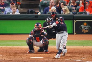 HOUSTON, TEXAS - OCTOBER 23: Kurt Suzuki #28 of the Washington Nationals hits a solo home run against the Houston Astros during the seventh inning in Game Two of the 2019 World Series at Minute Maid Park on October 23, 2019 in Houston, Texas. (Photo by Tim Warner/Getty Images)